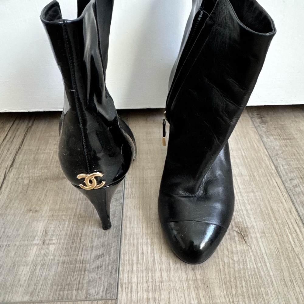 100% AUTHENTIC CHANEL black patent leather bootie.